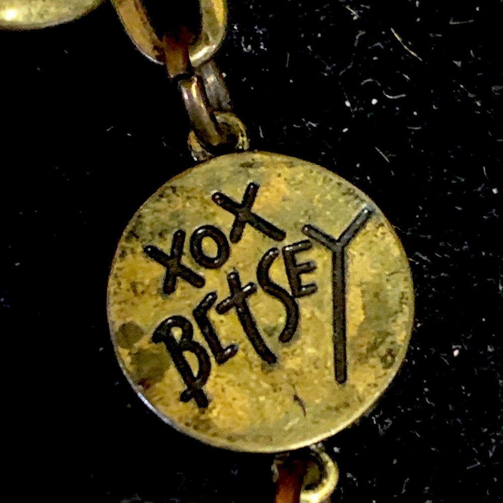 Betsey Johnson long brass colored Necklace